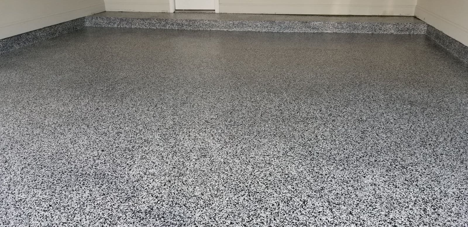 Epoxy Flake Flooring for Sleek Garage Transformation image