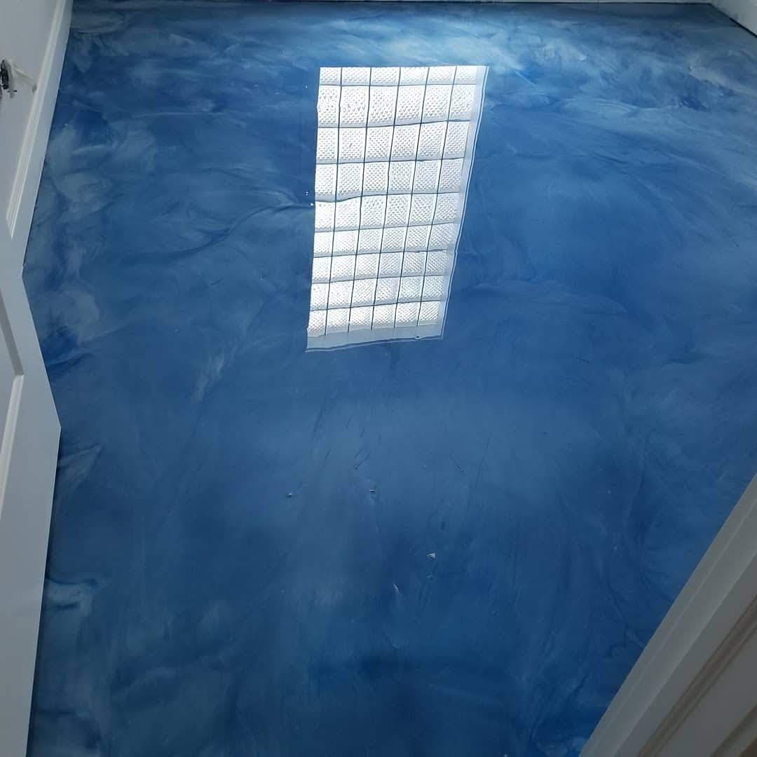 Stunning Metallic Epoxy Flooring Makeover image